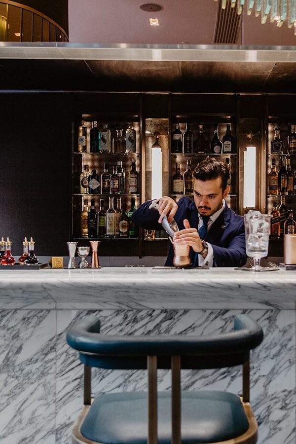 Bartender making cocktail at Prince de Galles